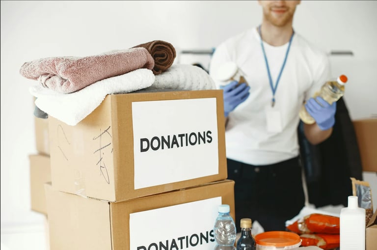 Volunteer organizing donations